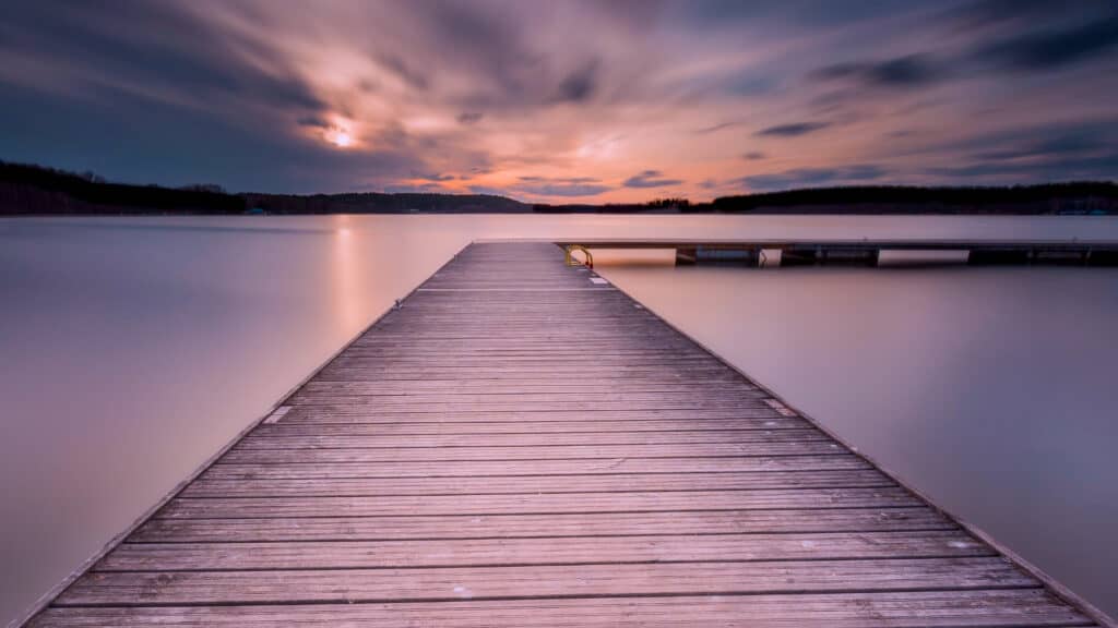 Long exposure image of a pier. Water in the lake is  blurred