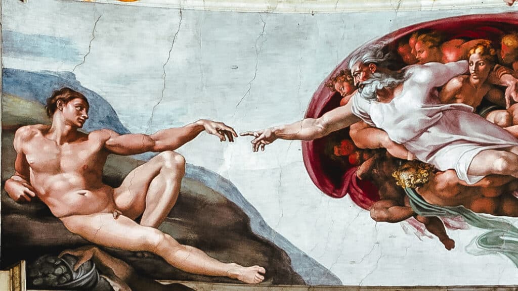 god giving birth to adan representated by Michelangelo 
